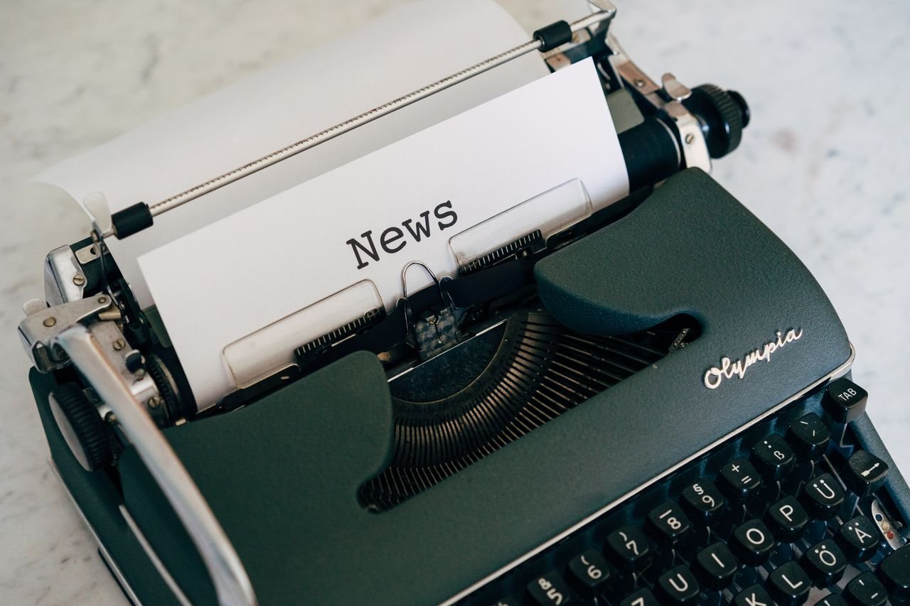 About Close-up of an antique typewriter with 'News' on paper.